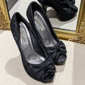Black lace pumps